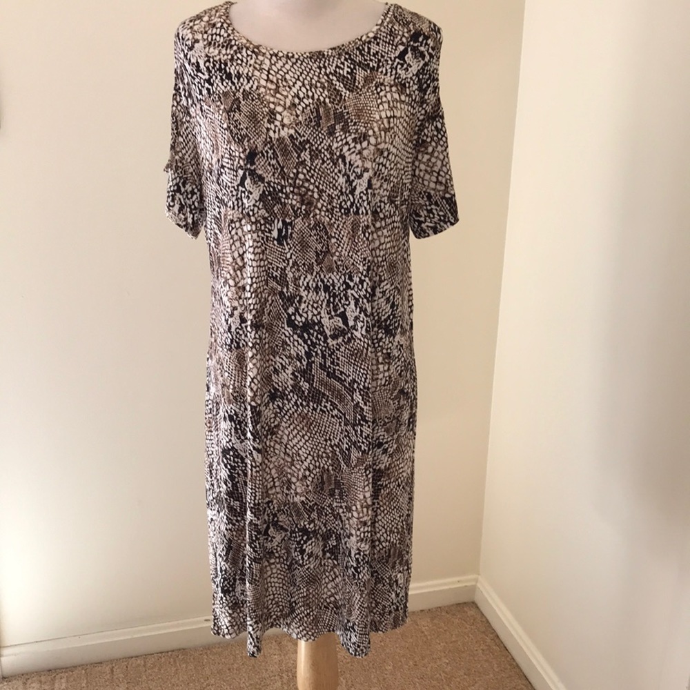 Calvin Klein large animal print cold shoulder dress.